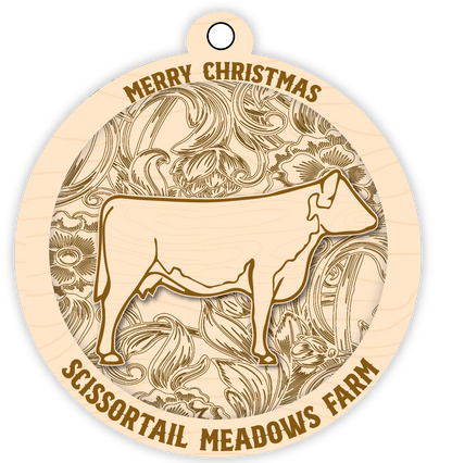 Wooden ornament with a cow silhouette and decorative patterns, featuring 'Merry Christmas' and 'Scissortail Meadows Farm'.