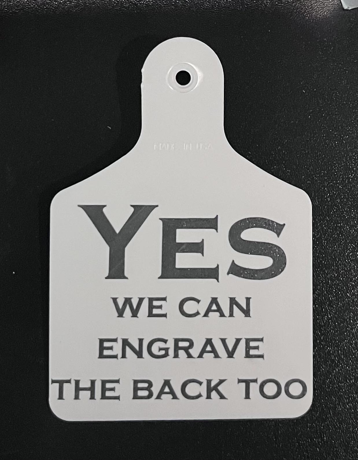 white tag  with text 'YES WE CAN ENGRAVE THE BACK TOO' on a black background